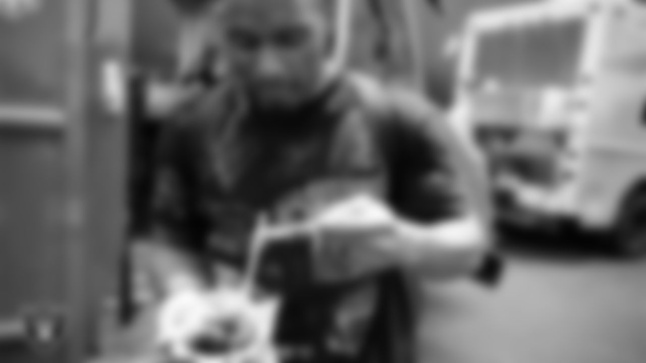 Las Vegas Raiders running back Brandon Bolden (34) enjoys a snow cone from a food truck at Intermountain Health Performance Center.