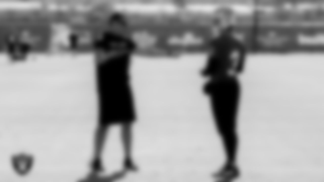 Las Vegas Raiders head strength and conditioning coach A.J. Neibel and quarterback Jarrett Stidham (3) during practice at Intermountain Healthcare Performance Center.