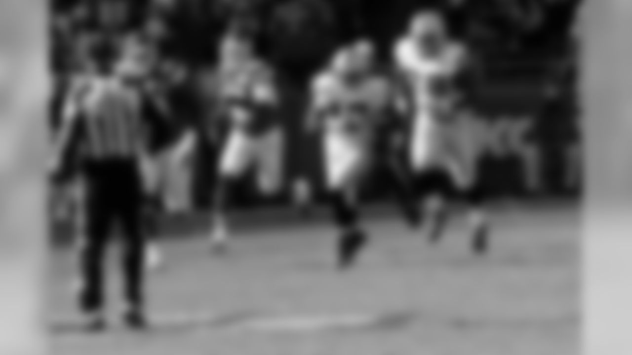 WR Denarius Moore beats the defense and runs down the field.