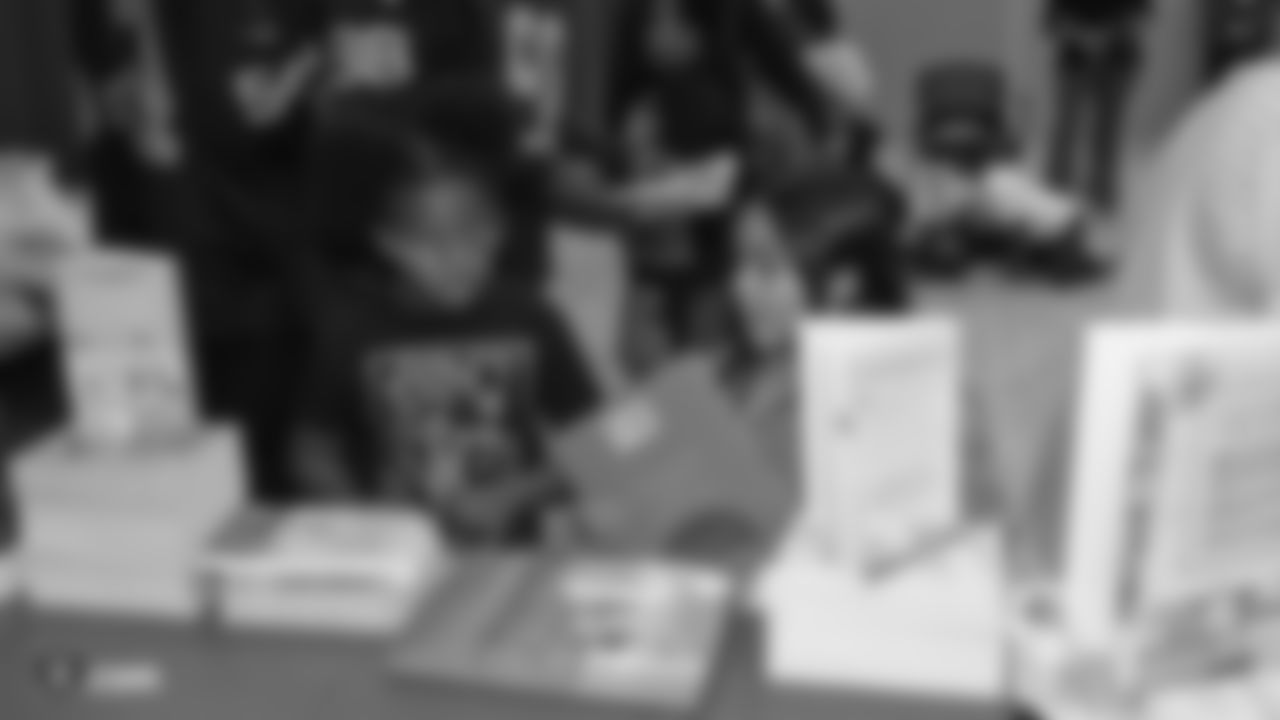 Oakland Raiders defensive tackle Clinton McDonald and his Light Into Darkness Foundation, along with linebacker Emmanuel Lamur, linebacker Kyle Wilber, punter Johnny Townsend, defensive tackle Frostee Rucker, and fullback Ryan Yurachek, partner with the nonprofit First Book by hosting a reading party to promote literacy at the West Oakland Youth Center, Tuesday, December 11, 2018, in Oakland, California.