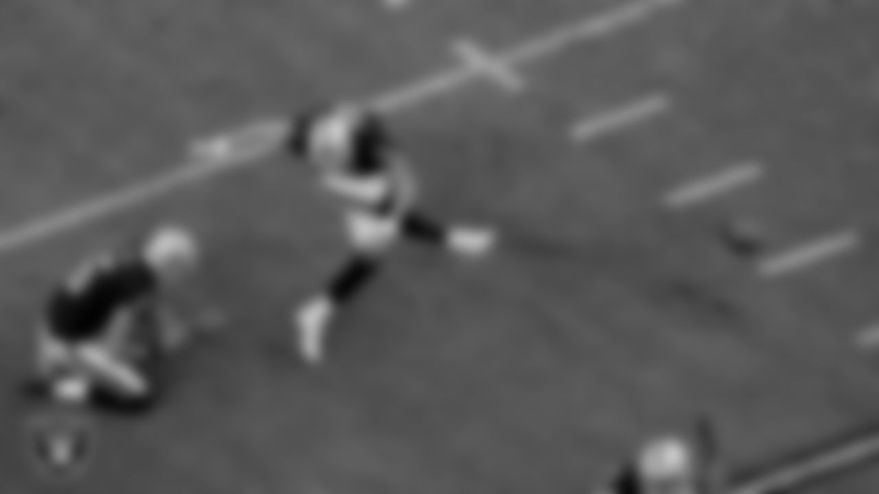 Las Vegas Raiders kicker Daniel Carlson (2) kicks a PAT during the regular season game against the Tampa Bay Buccaneers at Allegiant Stadium.