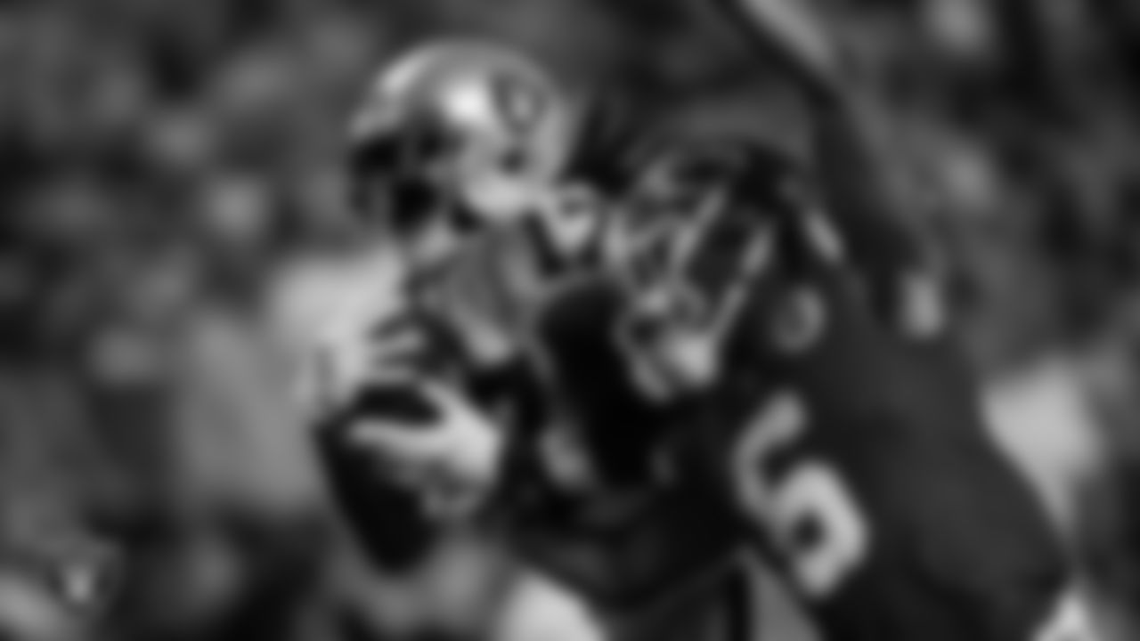 Las Vegas Raiders wide receiver Davante Adams (17) makes a 48-yard touchdown catch during the regular season away game against the Kansas City Chiefs at GEHA Field at Arrowhead Stadium.