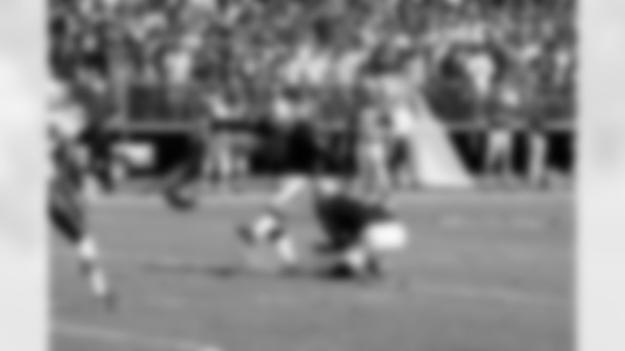 K Sebastian Janikowski kicks the PAT.
