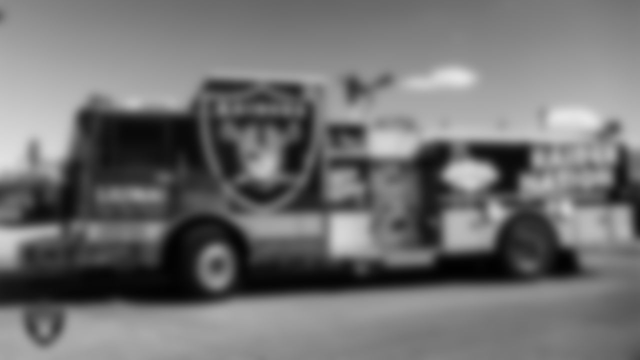 A Las Vegas Raiders wrapped firetruck on display during the Health Nation Block Party.