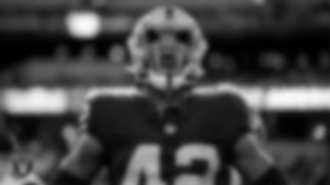 Las Vegas Raiders safety Chris Smith II (42) on the sidelines before the Las Vegas Raiders' preseason away game against the Dallas Cowboys at AT&T Stadium.