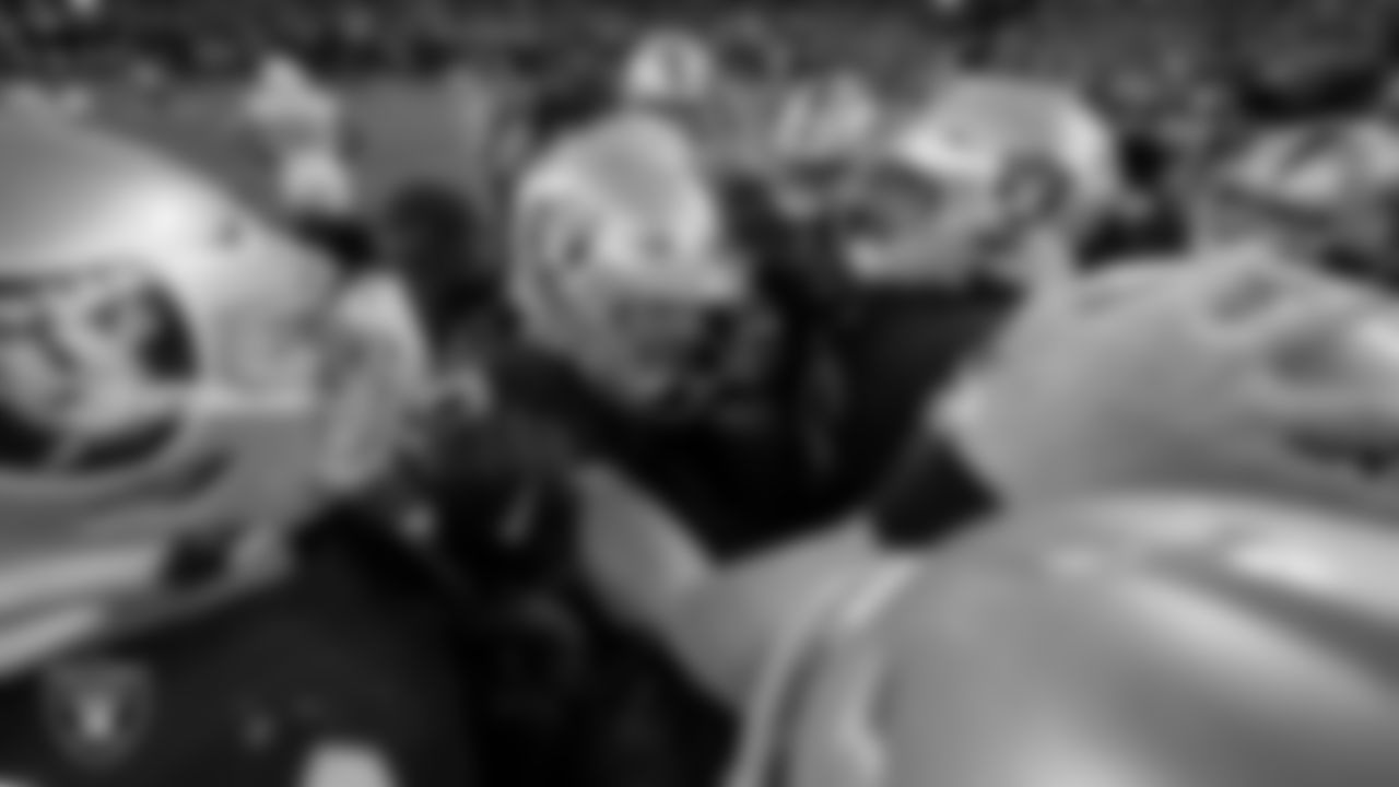 Las Vegas Raiders kicker Daniel Carlson (2) is congratulated by teammates after hitting a game winning 47-yard field goal during the regular season home game against the Los Angeles Chargers.