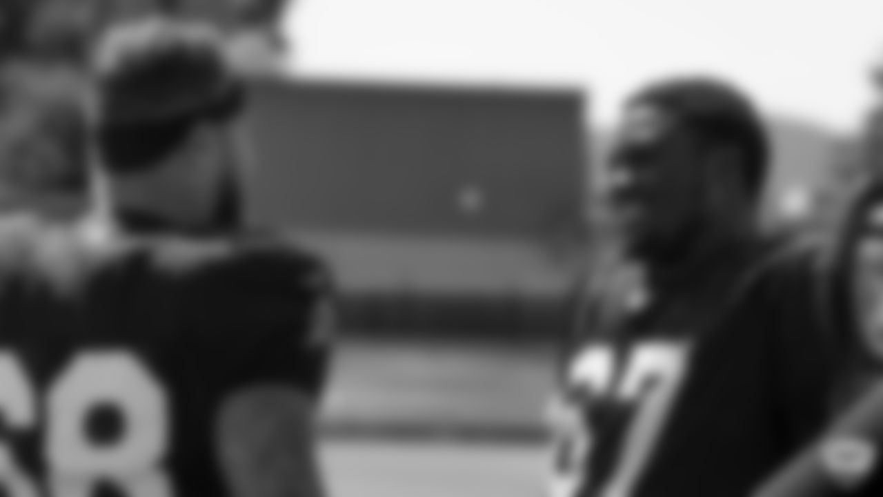 Raiders tackle Andre James (68) and guard Lester Cotton Sr. (67) on the field for practice at 2019 Training Camp.