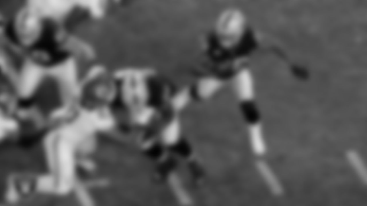 Las Vegas Raiders guard John Simpson (76) and running back Josh Jacobs (28) during the regular season home game against the Kansas City Chiefs.