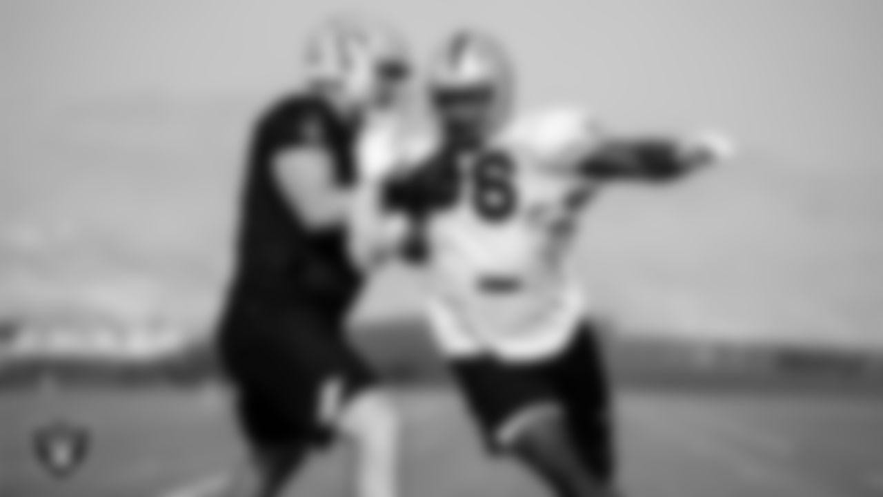 Las Vegas Raiders tackle Kolton Miller (74) and defensive end Clelin Ferrell (96) on the field for practice at 2020 Training Camp.