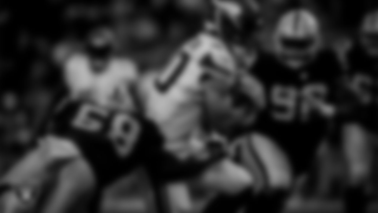 Las Vegas Raiders linebacker Darien Butler (58) makes a tackle during the preseason home game against the Minnesota Vikings at Allegiant Stadium.
