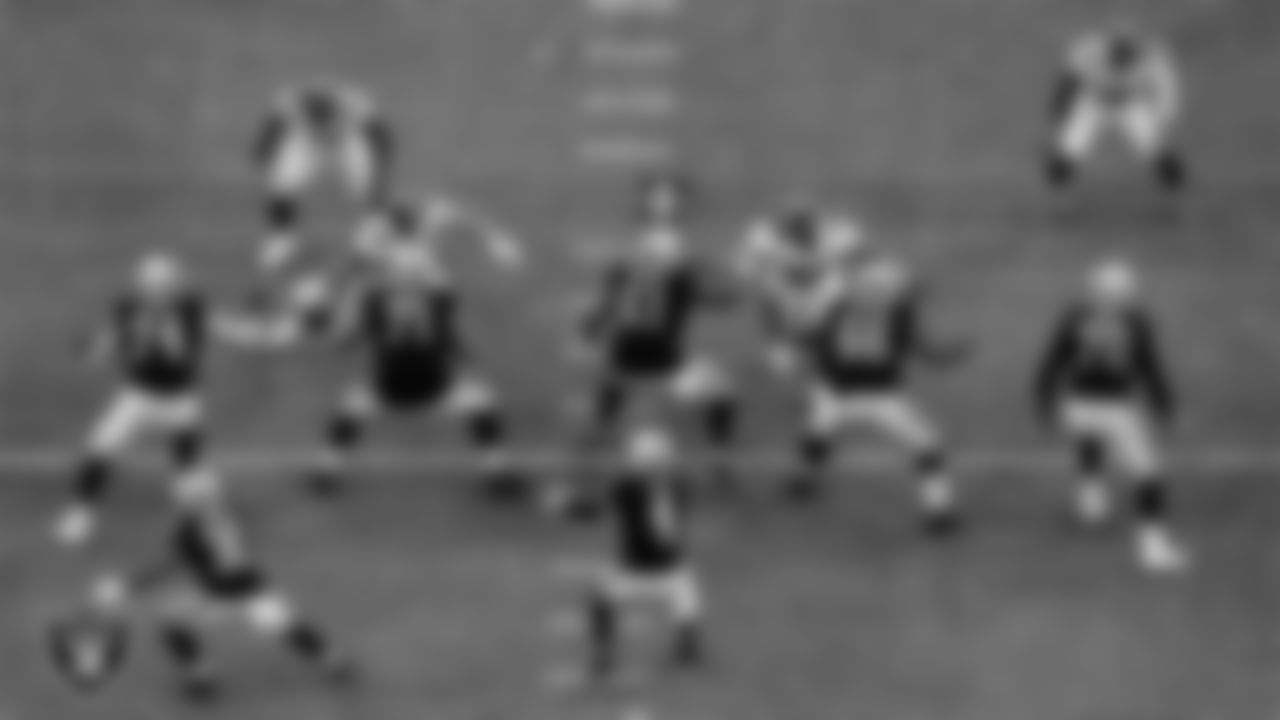 Las Vegas Raiders running back Jalen Richard (30), tackle Kolton Miller (74), tackle Denzelle Good (71), center Rodney Hudson (61), guard Gabe Jackson (66), tackle Sam Young (70) block as quarterback Derek Carr (4) receives the snap during the regular season home game against the Tampa Bay Buccaneers.