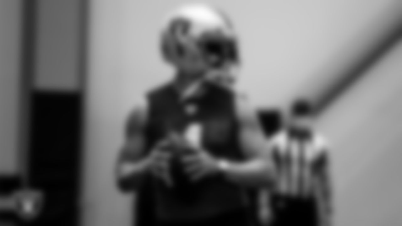 Las Vegas Raiders quarterback Derek Carr (4) on the field for a walkthrough.