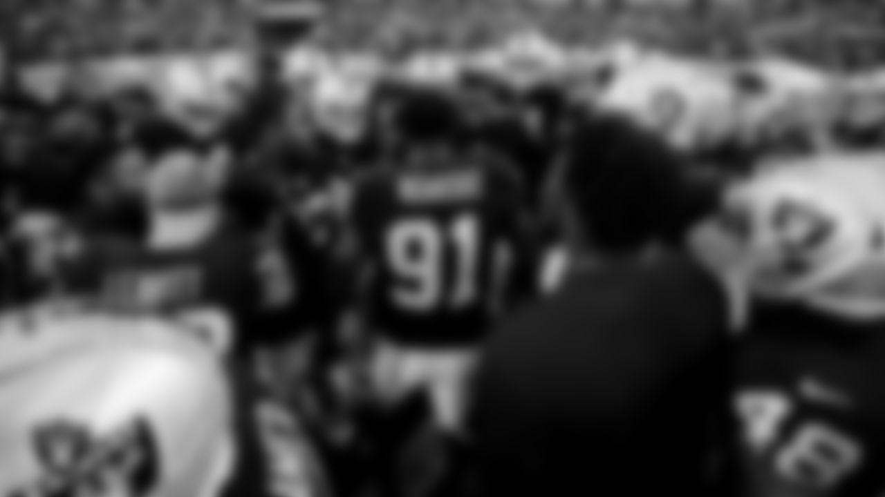 The Las Vegas Raiders huddle during warm ups before the regular season away game against the Dallas Cowboys.