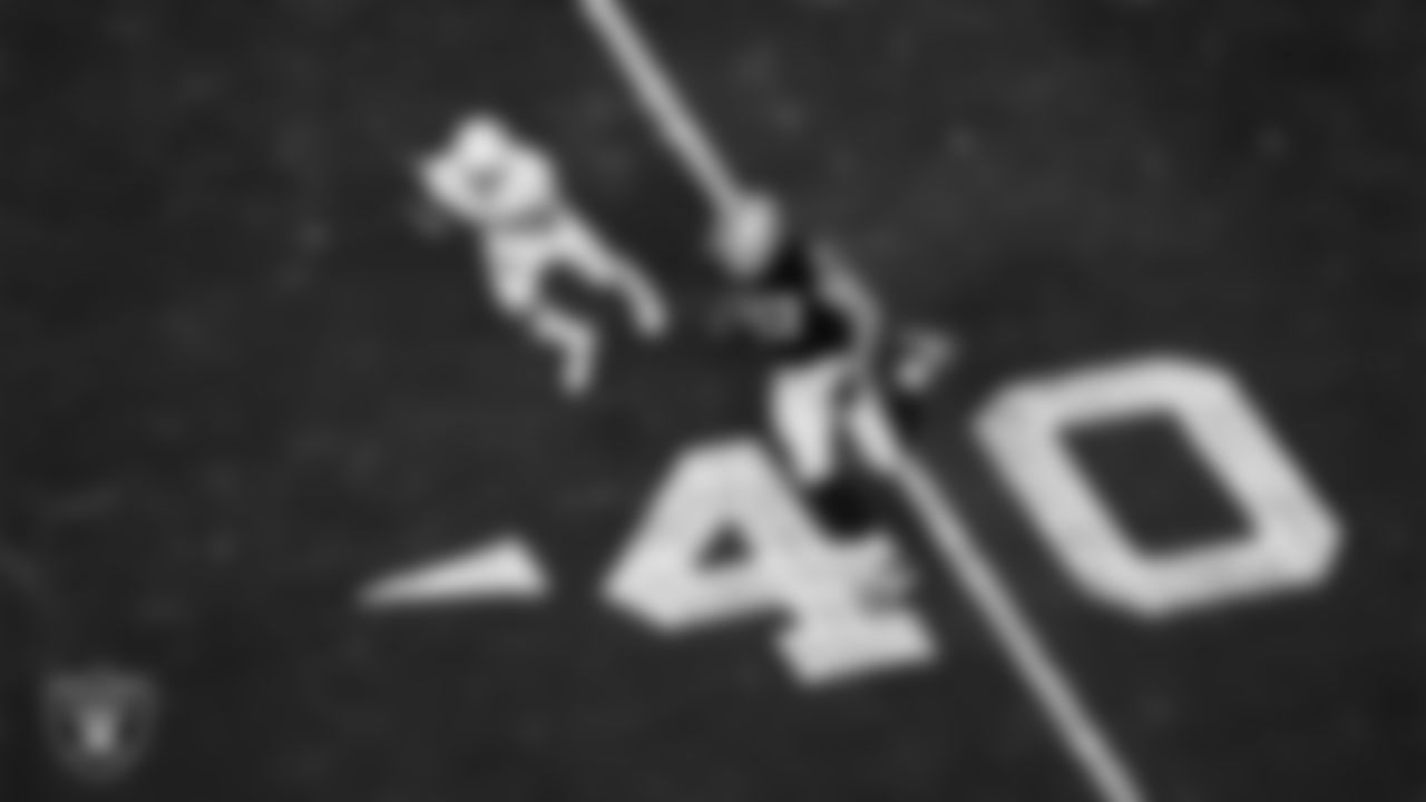 Las Vegas Raiders tight end Foster Moreau (87) runs after making a catch during the regular season home game against the Los Angeles Chargers.
