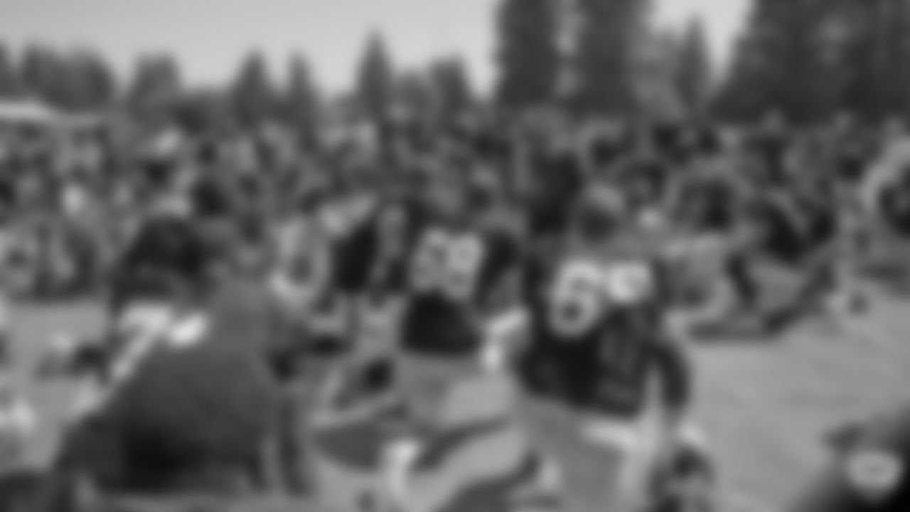 Raiders Head Coach Jon Gruden huddles up the team on the field for a joint practice with the Los Angeles Rams at 2019 Training Camp.