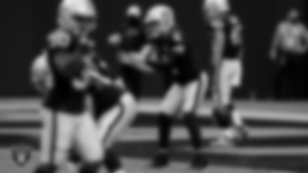 The Raiders warm up before the regular season game against the Buffalo Bills at Allegiant Stadium.