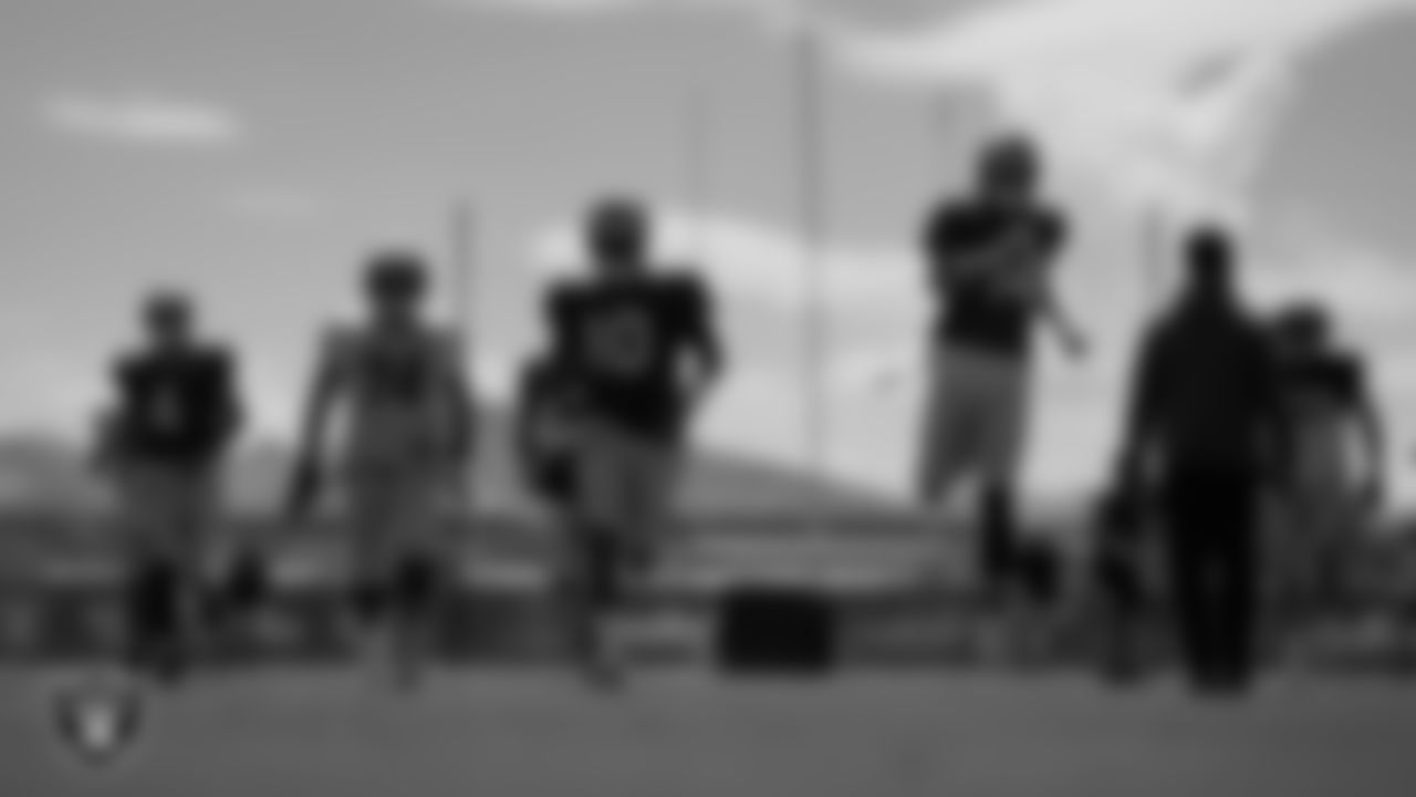 Las Vegas Raiders quarterback Aidan O'Connell (4), tackle Kolton Miller (74), quarterback Jimmy Garoppolo (10) and quarterback Chase Garbers (14) on the field for practice at 2023 Training Camp at Intermountain Health Performance Center.