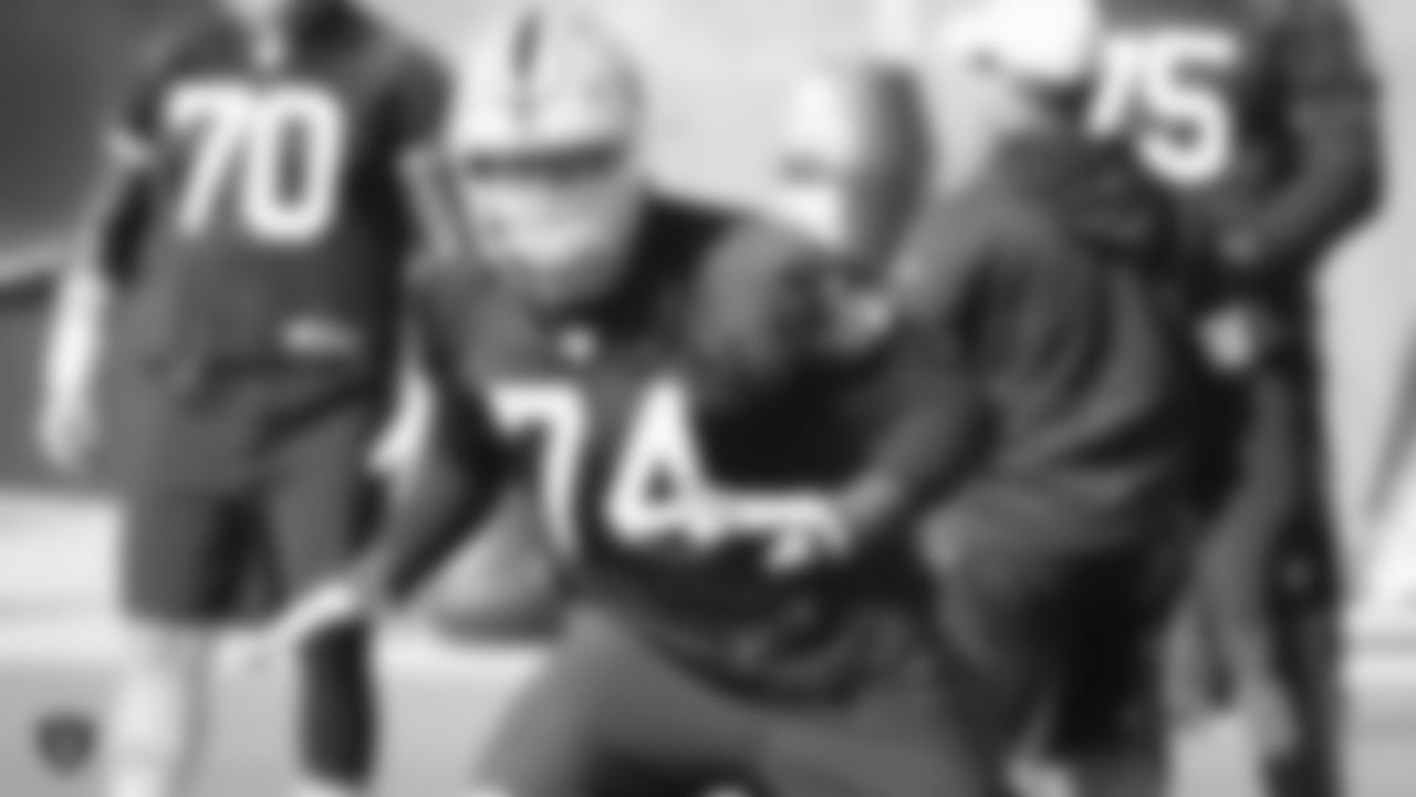 Oakland Raiders tackle Kolton Miller (74) goes through offensive drills during practice.