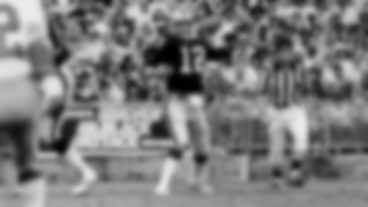 Raiders quarterback Ken Stabler (12) passes during the regular season home game against the Atlanta Falcons at Oakland-Alameda County Coliseum, Sunday, October 14, 1979, in Oakland, Calif.