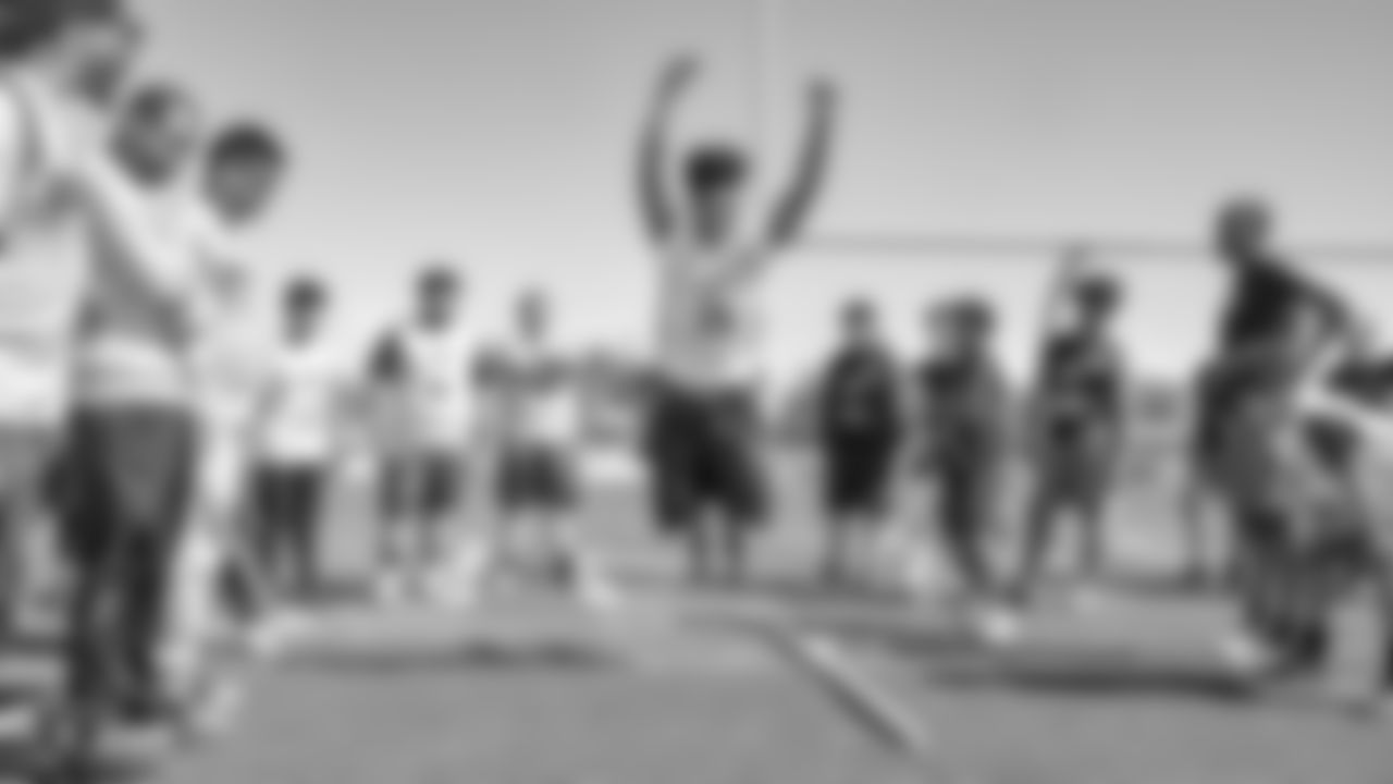The Raiders, represented by alumnus Leo Gray, collaborate with the Las Vegas Metro Police Activities League to start a 7-on-7 NFL FLAG Passing League for high school junior varsity athletes, Saturday, April 20, 2019, at Rancho High School in Las Vegas, Nev.