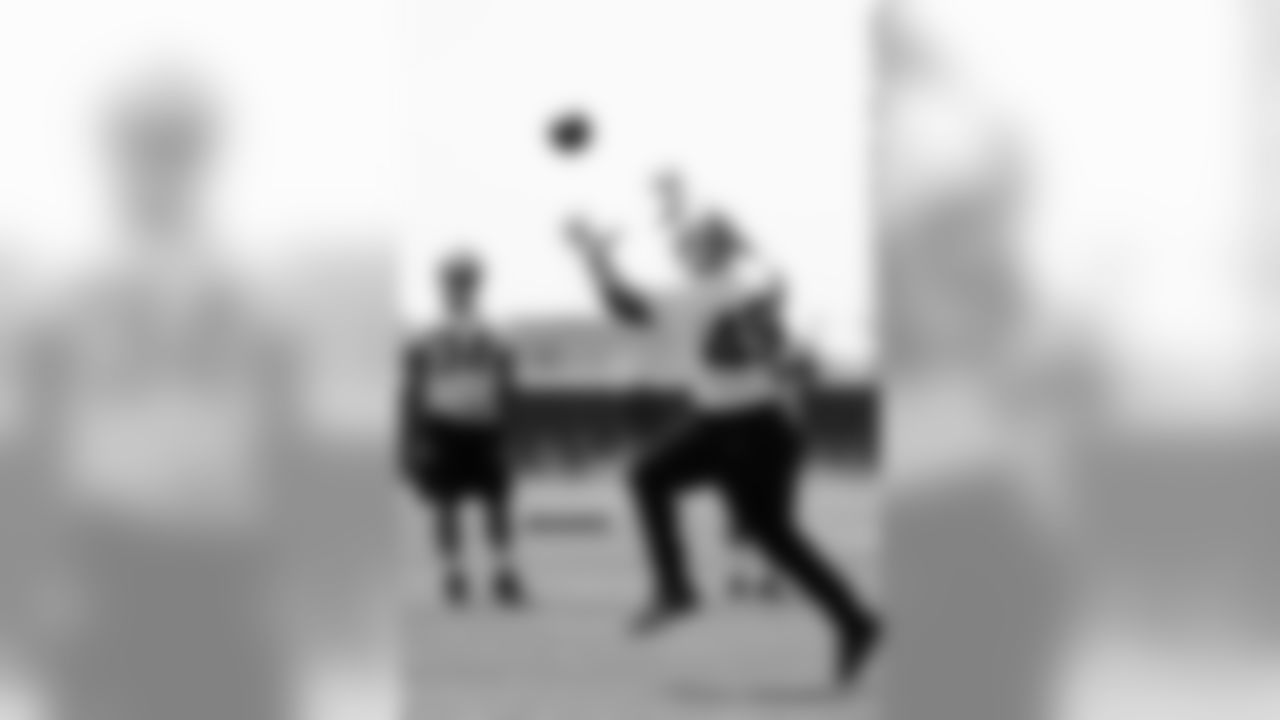 FB Marcel Reece goes up to make the catch.