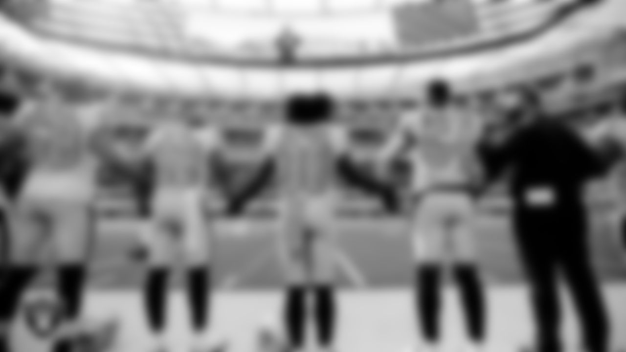 The Raiders during the anthem before the regular season game against the Los Angeles Chargers at SoFi Stadium.