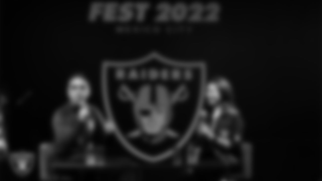 MC Enrique Garay interviews Las Vegas Raiders President Sandra Douglass Morgan during Raider Nation Fan Fest 2022.