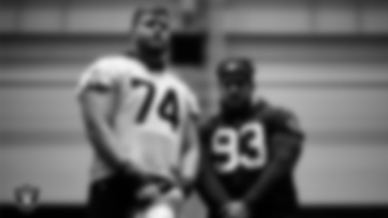 Las Vegas Raiders tackle Kolton Miller (74) and defensive tackle Kyle Peko (93) during practice at Intermountain Healthcare Performance Center.