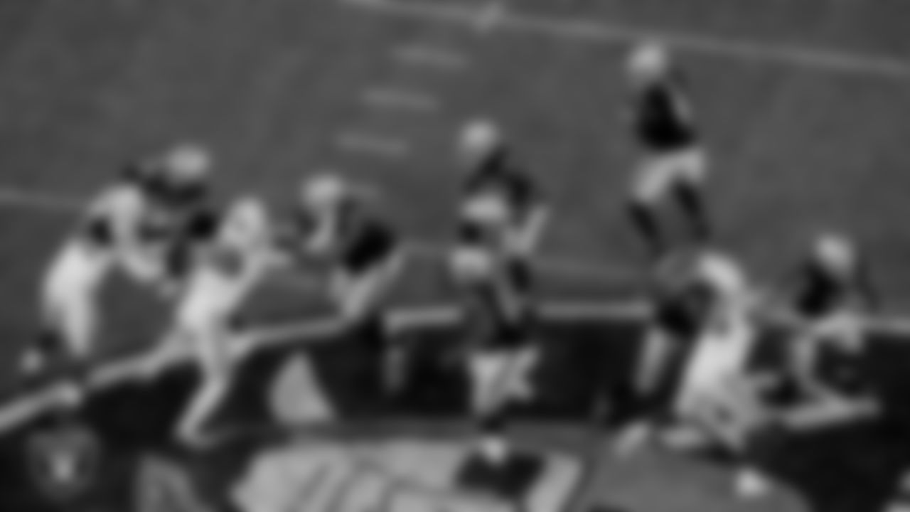 Las Vegas Raiders tight end Jason Witten (82), tackle Trent Brown (77), guard Gabe Jackson (66), center Rodney Hudson (61), tackle Denzelle Good (71), running back Devontae Booker (23) and quarterback Derek Carr (4) during the regular season game against the Indianapolis Colts at Allegiant Stadium.