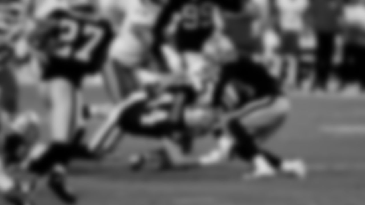 Las Vegas Raiders linebacker Nick Kwiatkoski (44) and safety Jeff Heath (38) during the regular season game against the Kansas City Chiefs at Allegiant Stadium.