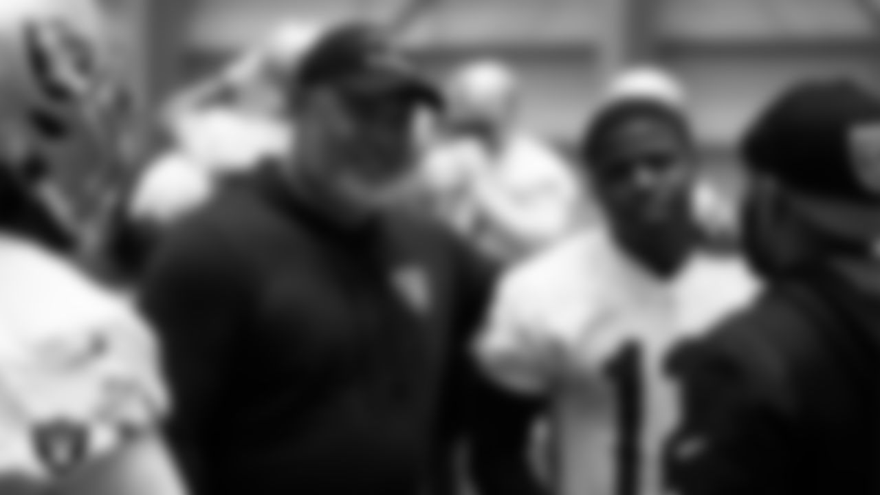 Las Vegas Raiders running backs coach Kennedy Polamalu and wide receiver Justin Hall (12) at Mandatory Minicamp.
