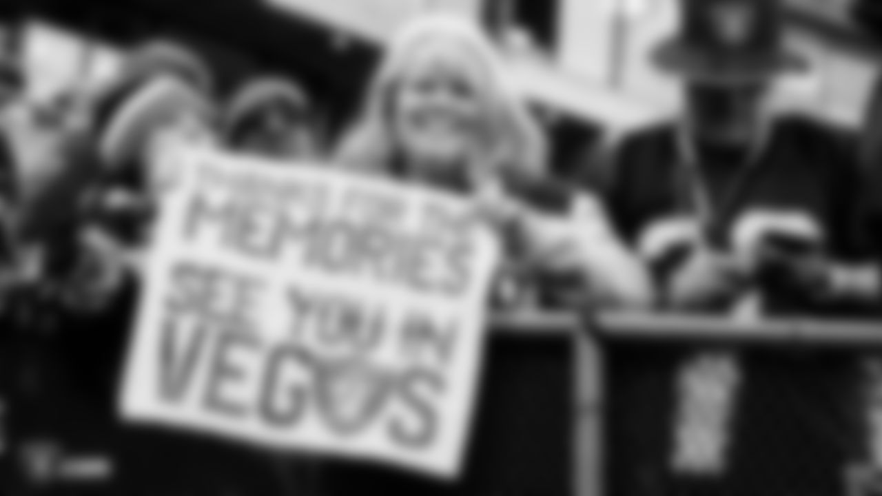 A Raiders fan holds a sign after the Raiders regular season game against the Jacksonville Jaguars.
