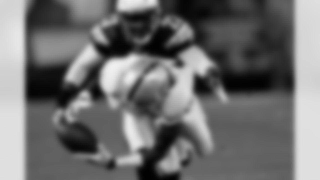 WR Denarius Moore holds the ball with his fingertips in a seemingly impossible 46-yard catch.