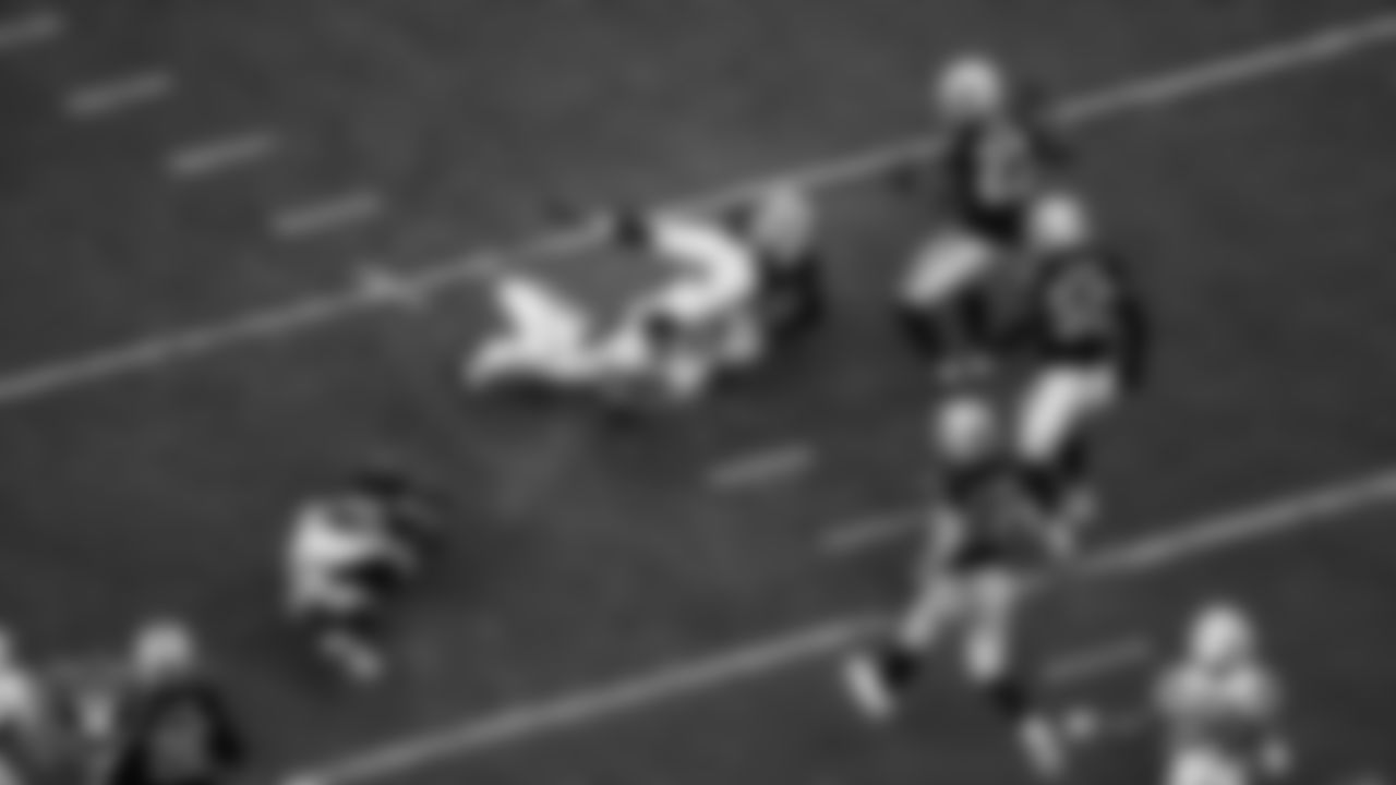 Las Vegas Raiders cornerback Amik Robertson (21) forces a fumble during the regular season home game against the Indianapolis Colts at Allegiant Stadium.