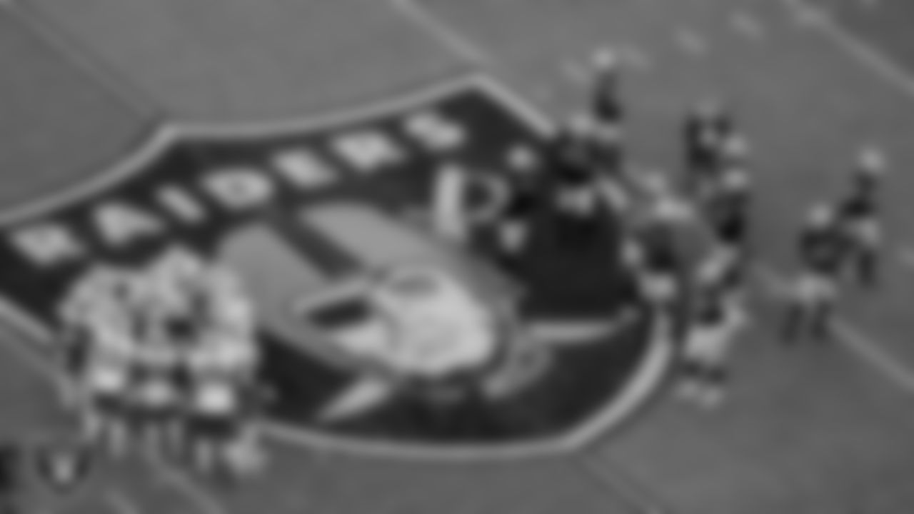 The Las Vegas Raiders defense huddles during the regular season game against the Buffalo Bills at Allegiant Stadium.