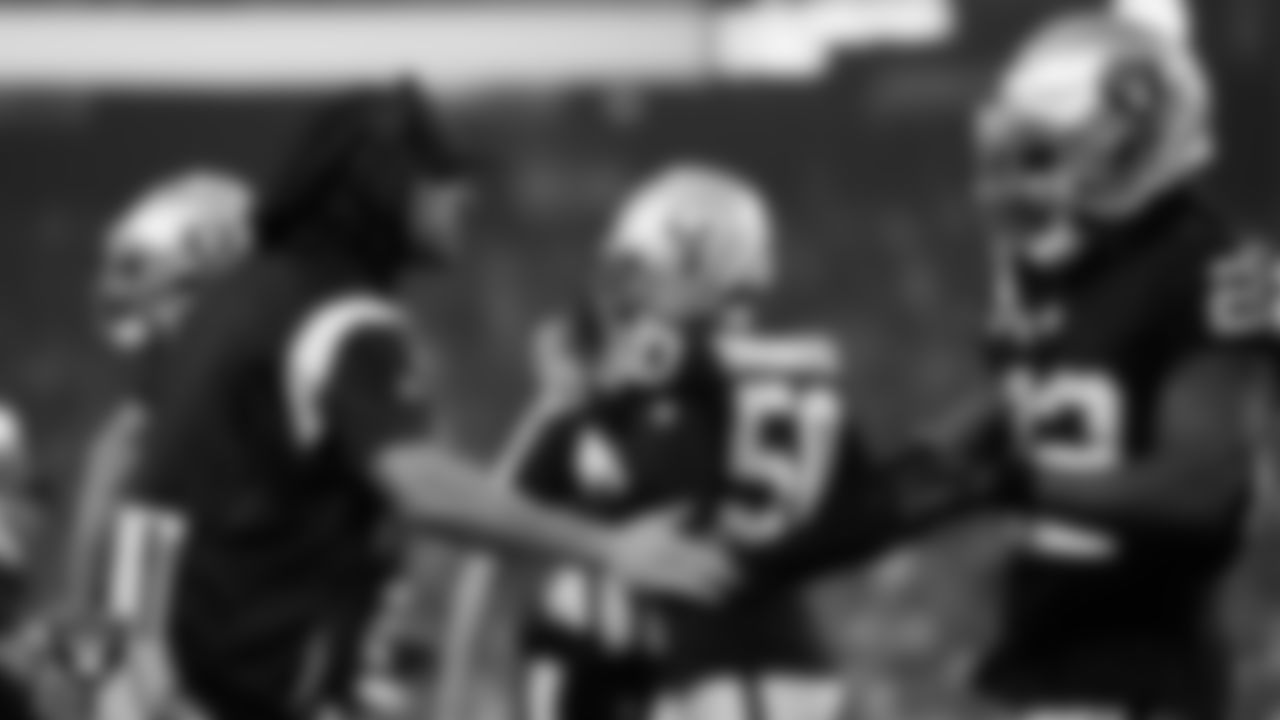 Las Vegas Raiders returners coach and coaching assistant Danny Amendola and running back Ameer Abdullah (22) on the sidelines during the regular season home game against the Green Bay Packers at Allegiant Stadium.