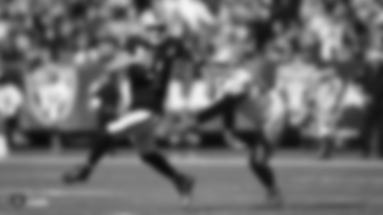 Raiders quarterback Derek Carr (4) looks for an open receiver during the regular season game against the Detroit Lions.