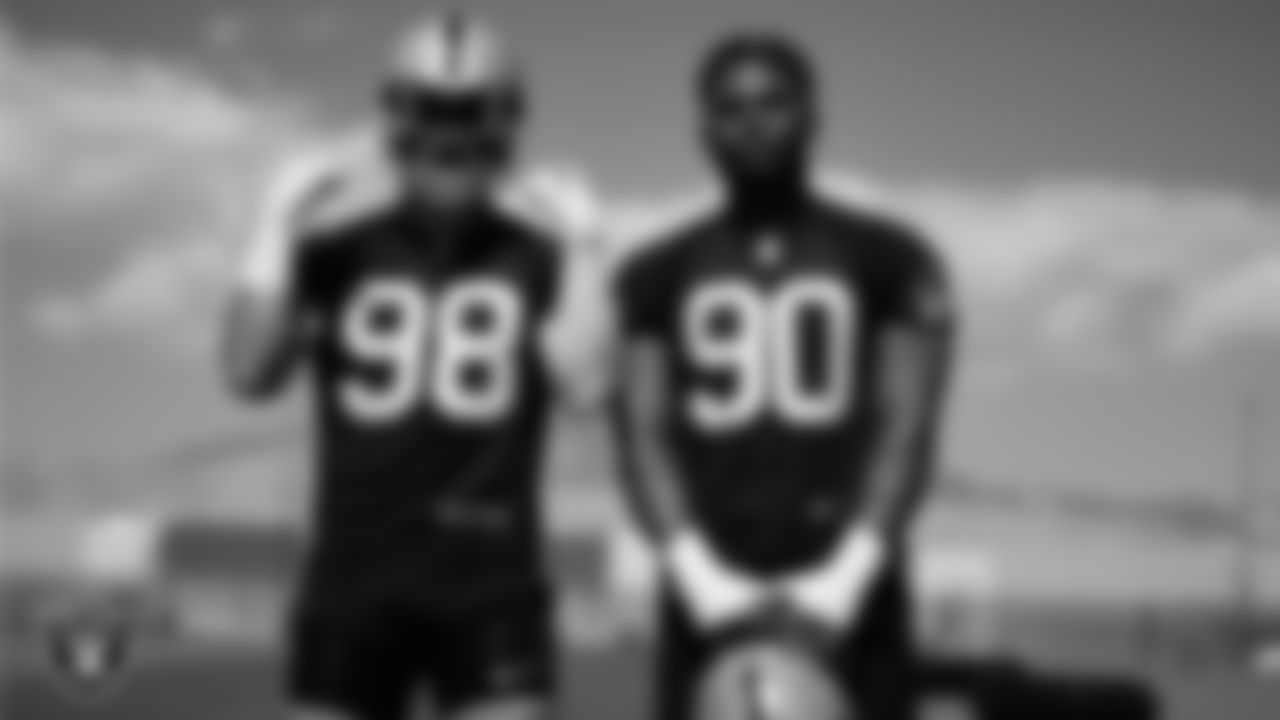 Las Vegas Raiders defensive end Maxx Crosby (98) and defensive lineman Jerry Tillery Jr. (90) during mandatory minicamp at Intermountain Health Performance Center.