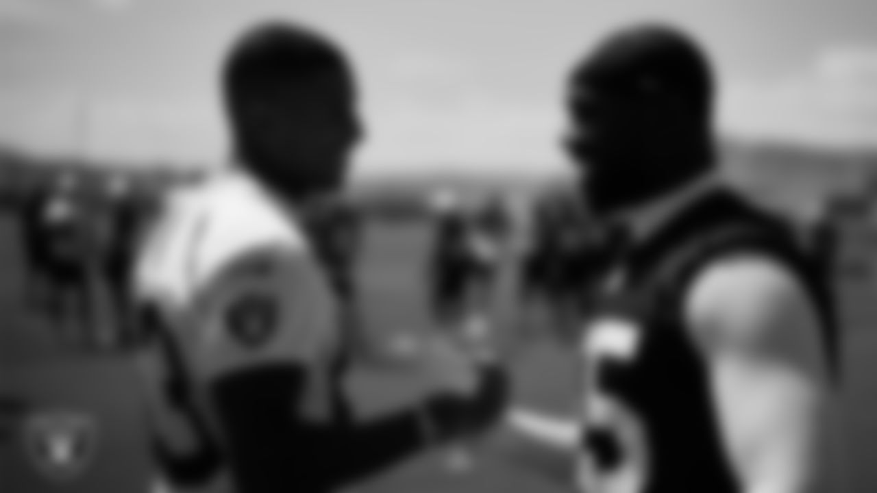 Las Vegas Raiders tight end Darren Waller (83) and defensive end Chandler Jones (55) during practice at Intermountain Healthcare Performance Center.