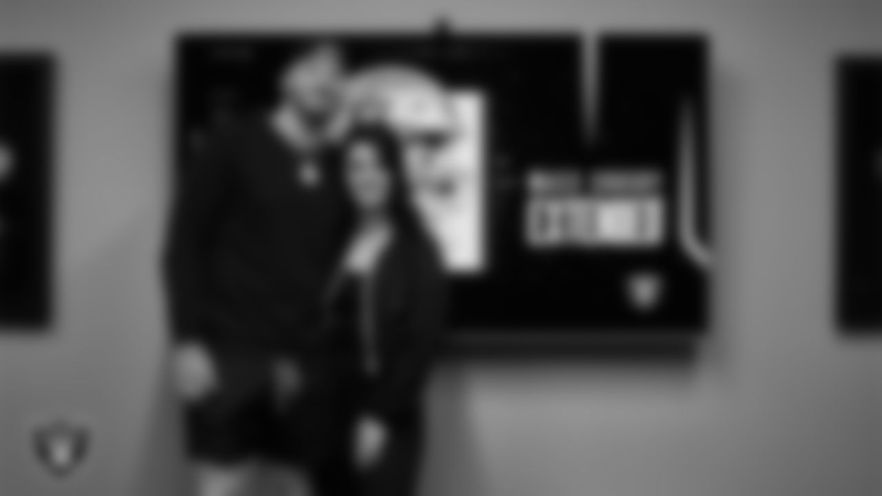 Las Vegas Raiders defensive end Maxx Crosby and his fiancée Rachel after signing a contract extension.