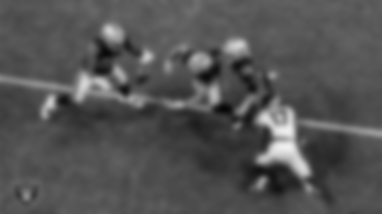 Las Vegas Raiders linebacker Nicholas Morrow (50), safety Johnathan Abram (24) and cornerback Nevin Lawson (26) go after a fumble during the regular season home game against the Denver Broncos.