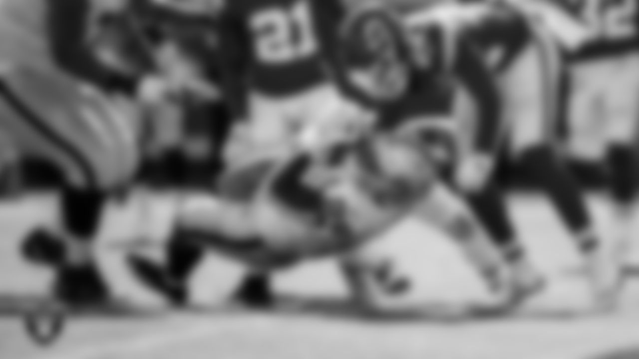 Las Vegas Raiders running back Josh Jacobs (28) rushes for a 7-yard touchdown during the regular season away game against the Kansas City Chiefs.