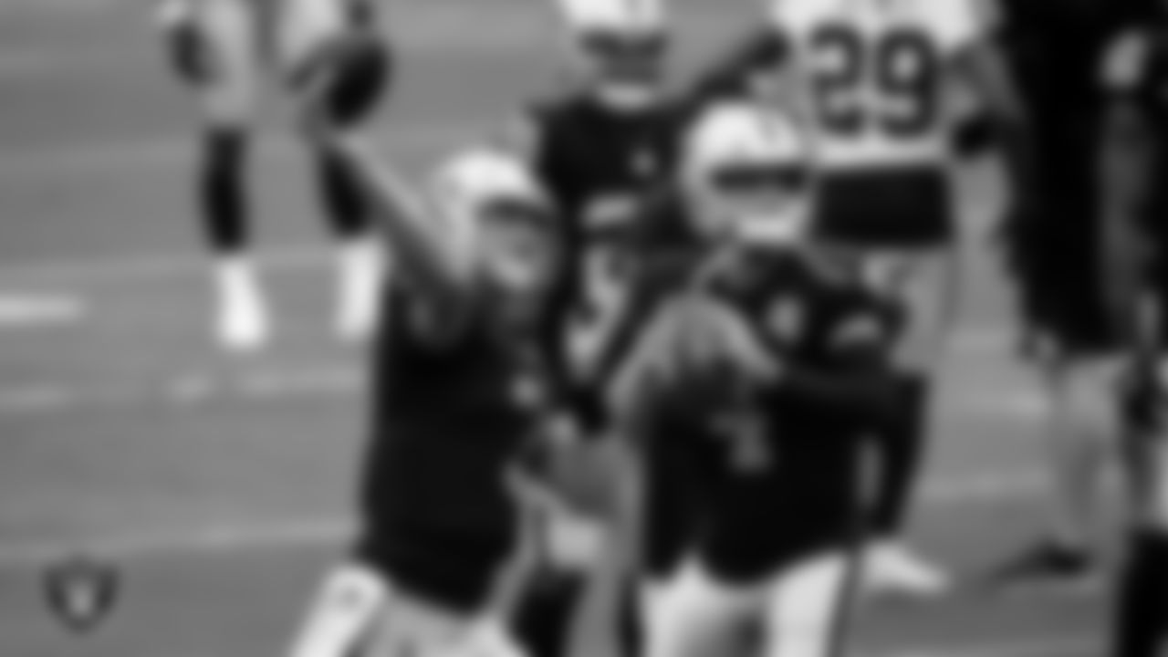 Las Vegas Raiders quarterback Nathan Peterman (3) and quarterback Derek Carr (4) on the field for practice at 2020 Training Camp.