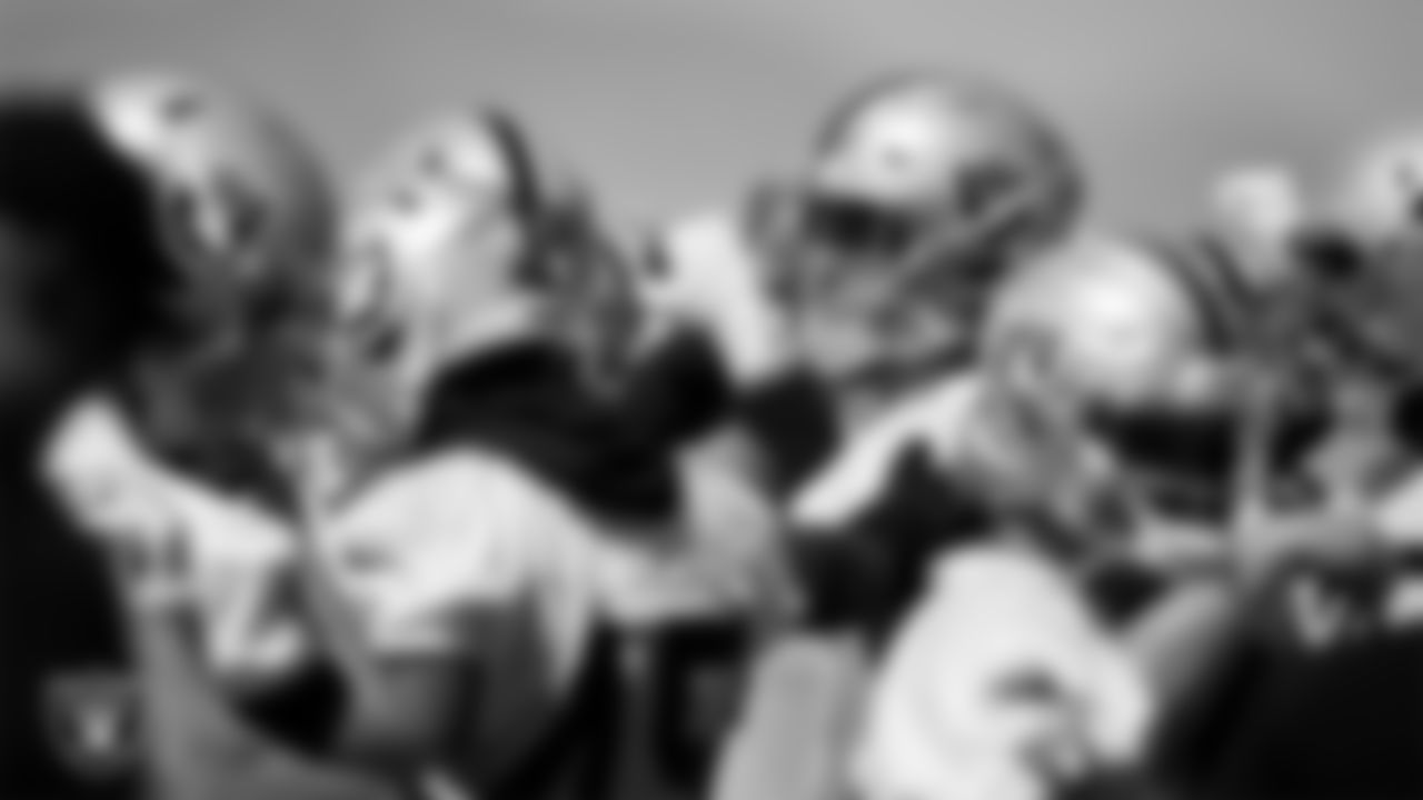 The Las Vegas Raiders huddle during Day Three of 2022 Veteran Minicamp.