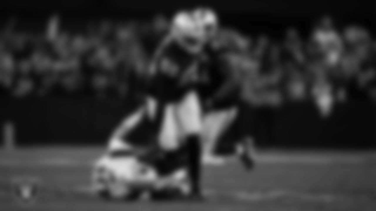 Las Vegas Raiders defensive end Chandler Jones (55) returns a fumble for a 48-yard touchdown during the regular season home game against the New England Patriots at Stadium.