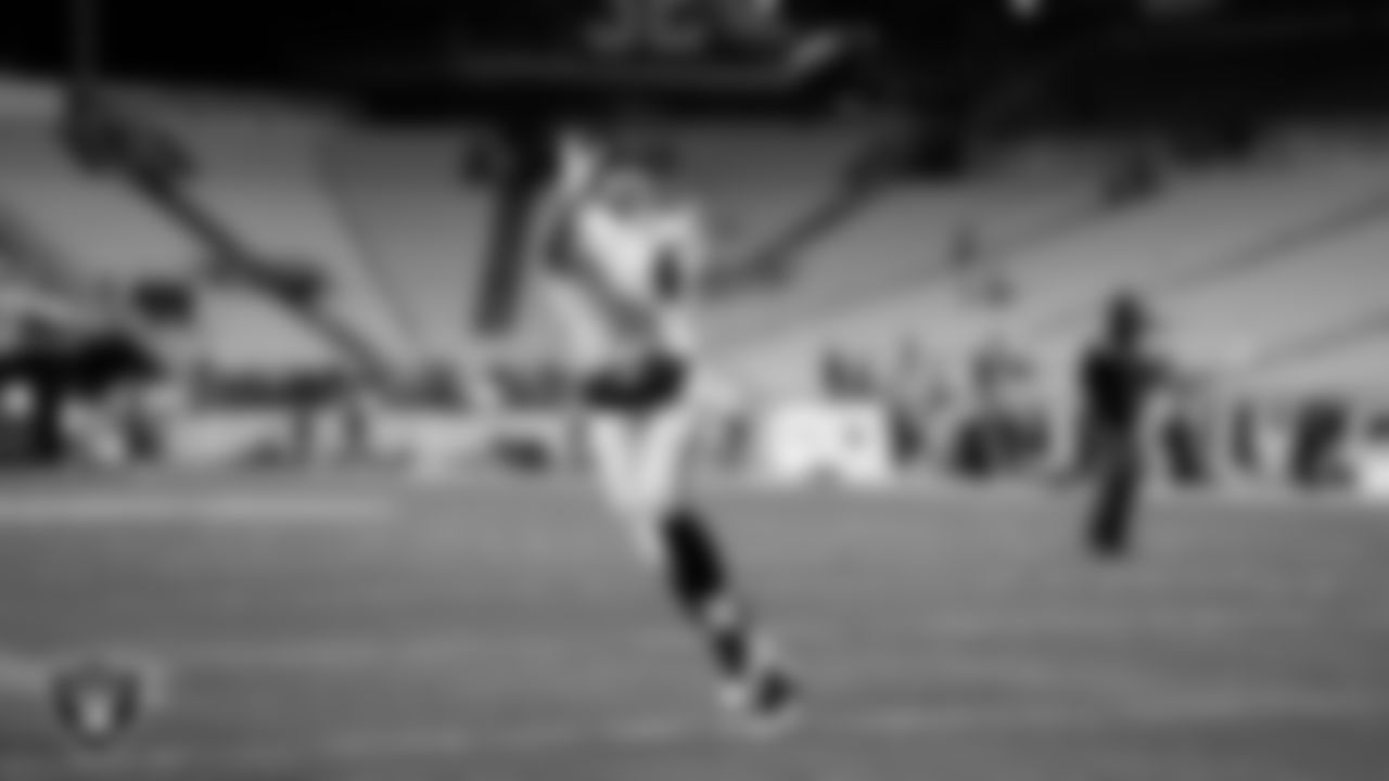 Las Vegas Raiders tight end Foster Moreau (87) warming up before the regular season away game against the Pittsburgh Steelers at Acrisure Stadium.