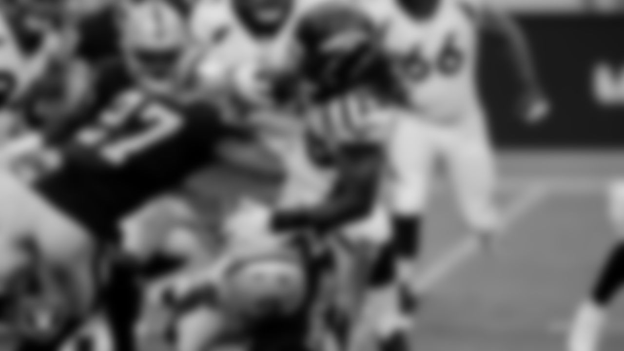 Las Vegas Raiders cornerback Trayvon Mullen (27) and linebacker Nick Kwiatkoski (44) during the regular season game against the Denver Broncos at Allegiant Stadium.