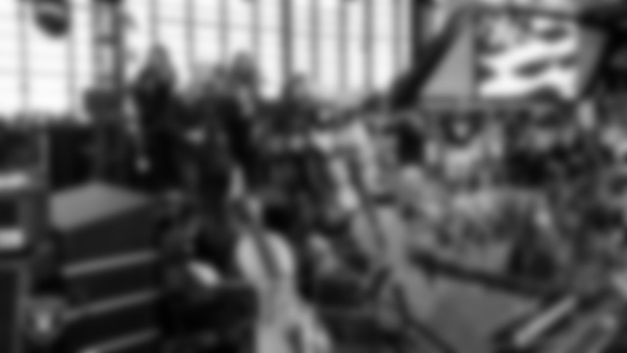 The Raiders House Band performs as members of the United States Air Force take part in a reenlistment ceremony before the Las Vegas Raiders regular season home game against the Cincinnati Bengals.