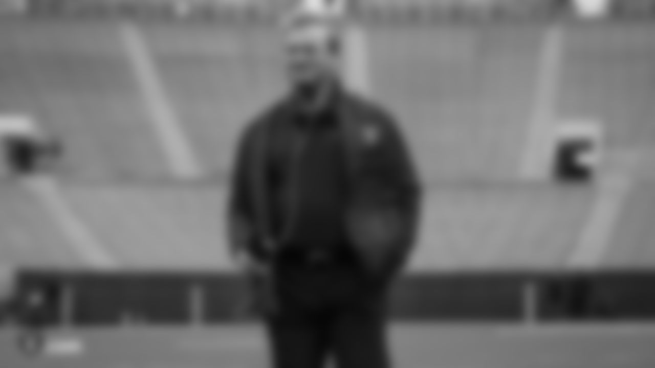 Raiders Head Coach Jon Gruden walks on the field on the field before the regular season game against the Green Bay Packers at Lambeau Field.