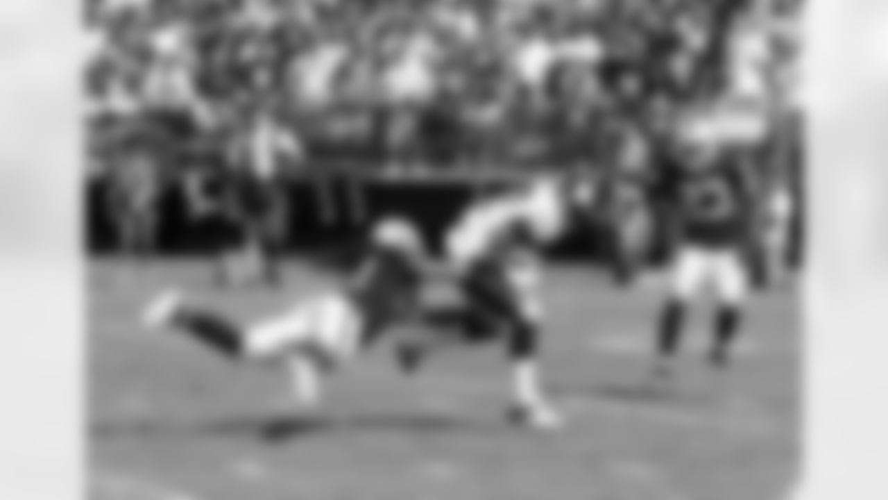 LB Philip Wheeler lays out to make the tackle.
